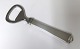 Hans Hansen. 
Silver (830). 
Arvesölv no.4. 
Capsule opener. 
Length 11,5 cm.
