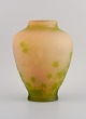 Large Émile Gallé vase in frosted art glass decorated with green thistles.