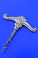 Pewter 
corkscrew. 
Height 11.5 cm. 
Bredte 10 cm.