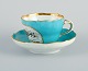 Antique Meissen coffee cup.
Hand painted in turquoise and gold decoration.