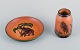 Ipsens Enke, 
ceramic vase 
and a ceramic 
dish.
Malibu and 
elephant motif.
Glaze in 
orange-green 
...