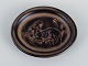 Knud Kyhn 
(1880-1969) for 
Royal 
Copehagen.
Small ceramic 
dish with a 
motif of a 
reclining ...