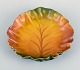 Ipsens, 
Denmark, 
leaf-shaped 
bowl. 
Glaze in 
autumn colours.
Model number 
...