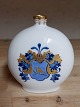 Pill-shaped 
Royal 
Copenhagen vase 
in porcelain 
with decorated 
noble coat of 
arms in 
overglaze. ...