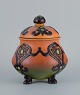 Ipsens, 
Denmark, 
beautiful Art 
Nouveau jar 
with glaze in 
orange and 
green ...