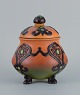 Ipsens, 
Denmark, 
beautiful Art 
Nouveau jar 
with glaze in 
orange and 
green ...