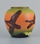 Ipsens, Denmark, vase with ducks, glaze in orange and green tones.