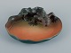 Ipsens, 
Denmark. Rare 
dish in 
hand-painted 
glazed ceramic 
with a lizard.
Model number 
...