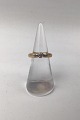 Georg Jensen 
18K Guld Ring 
med Brillant 
Ring Str. 47 
(US 4) Vægt 6.5 
gr (0.23 oz)