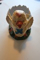 Figurine for 
the Eastern
An old 
figurine made 
of bisquit made 
as a chicken 
with an egg
It is ...