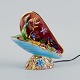 French lamp in the shape of a seashell with fish and aquatic plants.
Hand painted ceramics.
