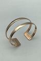 Hans Hansen 14 
ct Gold 
Bracelet 
Measures Diam 
5.8 cm x 5.2 
cm. (2.28 inch 
x 2.04 inch) 
Width 2.2 ...