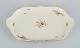 Rosenthal, Germany. "Sanssouci", large cream colored serving dish decorated with 
flowers and gold decoration.