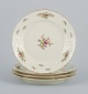 Rosenthal, Germany. "Sanssouci", four cream colored plates decorated with 
flowers and gold decoration.