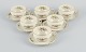 Rosenthal, Germany. "Sanssouci", six cream colored teacups with  saucers 
decorated with flowers and gold.
