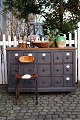 Old, 1800s 
grocery counter 
with a total of 
15 drawers, 
some with old 
white porcelain 
signs.
The ...