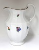 Royal 
Copenhagen. 
Ströblomst. 
Chocolate jug. 
Model 482 / 
8606. Height 23 
cm. (2. 
quality)