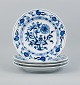 Meissen, Blue Onion pattern, a set of four hand painted dinner plates.