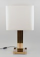 Lumica, Spain. 
Large art deco 
table lamp. 
Stem and foot 
in gold-plated 
metal with 
chrome-plated 
...