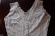 Good old blouse/top without sleeves and with buttons made of fabricMeasure:H: Waist-neckline ...