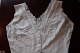 Good old 
blouse/top 
without sleeves 
and with 
buttons made of 
fabric
Measure:
H: 
Waist-neckline 
...