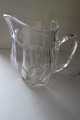 Antique cream 
jug , 
Chippendale, 
from the 
kastrup 
Glasværk, 
denmark
H. about 10cm
In a good ...