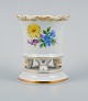 Meissen, Germany, small vase on four feet hand painted with floral motif.