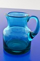 Pitcher of 
blue-green 
glass, height 
9.5 cm. 200 cl. 
Fine condition.