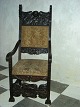 Chair of oak,  
Good condition, 
With defect on 
seat. Height 
144 cm. Bredte 
59 cm. Depth 72 
cm.