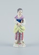 Meissen, 
Germany, 
porcelain 
figure. 
Overglaze.
Young woman 
with book.
Model number: 
...