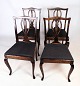 Dining room 
chairs in 
mahogany with a 
nice cutout in 
the backrest 
with black 
patterned 
fabric ...