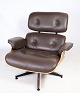 Charles Eames 
Lounge chair in 
brown leather 
and light 
walnut produced 
by Herman 
Miller designed 
...