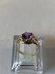 Women's ring 
with purple 
stones in #14 
carat gold
Size 58