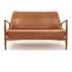 Ib Kofod-Larsen 
"The Seal" two 
seater sofa, 
teak and 
leather, by 
Brdr. Petersen, 
Denmark
Nice ...