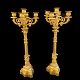 A pair of French candelabras in gilt bronze. France around 1830.H. 69 cm. Diam. 28 ...