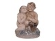 Rare Royal 
Copenhagen 
miniature 
figurine, Faun 
with girl.
The factory 
mark tells, 
that this ...