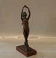 Sterett-
Gittings Kelsey 
Bronze Ballet 
girl with hands 
in the air 30 
cm on wooden 
stand no. 325 
...