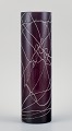 Purple hand-blown art glass vase decorated with silvery threads.