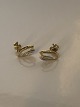 Earrings in #14 
carat gold and 
white gold
Stamped 585
Goldsmith: 
unknown
Height 13.40 
...