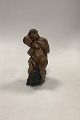 Kai Nielsen 
Stoneware 
Figurine no. 
4023 of Pan 
with Woman and 
Grapes. 23 cm H 
(9 1/16") In 
...