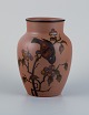 Hjorth Bornholm, Denmark, handmade ceramic vase decorated with a bird on a 
branch.