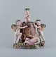 Meissen, large antique figure group. Rare figure with semi-naked children and 
wine barrel.
