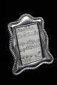 Old silver frame with glass and fine decorated edge. 23x19cm. (stamped with 
silver stamps)