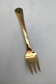 Georg Jensen 
Annual Pastry 
Fork 1989 Gilt 
Sterling Silver 
with enamel. 
Measures 13.5 
cm (5.31 inch)