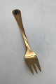 Georg Jensen 
Annual Pastry 
Fork 1992 Gilt 
Sterling Silver 
with enamel. 
Measures 13.5 
cm (5.31 inch)