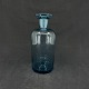 Height 18 cm.
The bottle is 
mouth blown 
with a polished 
pontil 
underneath.
Stopper and 
...