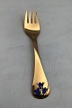 Georg Jensen 
Annual Fork 
1990 Gilt 
Sterling Silver 
with enamel. 
Measures 14.5 
cm (5.70 inch)
