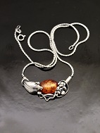 From sterling silver necklace