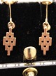 14 carat gold 
brick ear clip 
1.7 x 0.5 cm. 
from goldsmith 
Herman Siersbøl 
Copenhagen item 
no. 533940