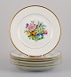 Bing & Grøndahl, six porcelain lunch plates hand-painted with polychrome flowers 
and gold decoration.